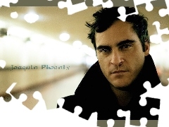 czarny strój, Joaquin Phoenix